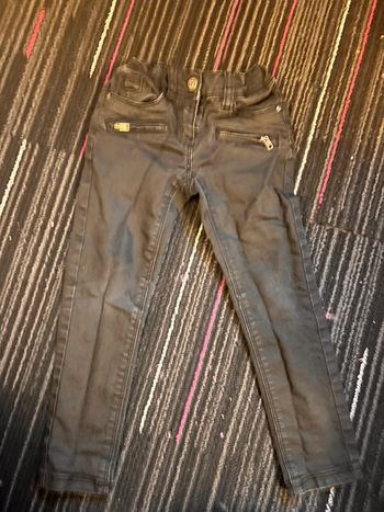 Jean noir slim tape à l’œil taille 4 ans