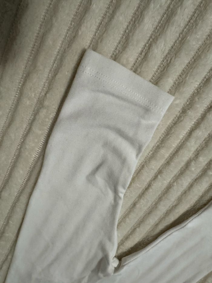 Legging  - blanc  en coton - kiabi - 6 mois - comme neuf - photo numéro 4