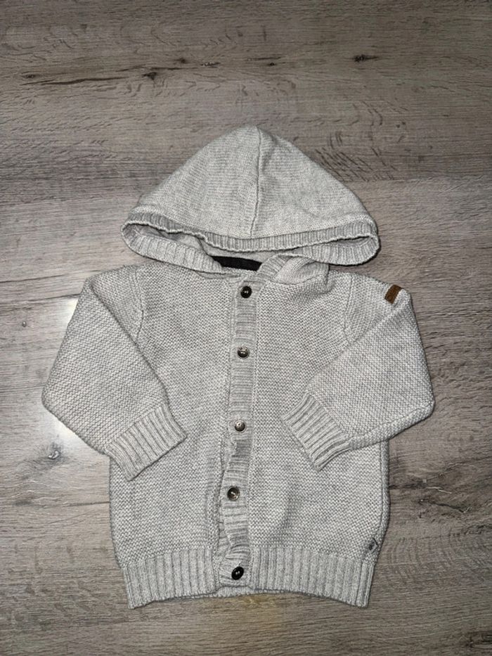 Gilet obaibi 12 mois neuf