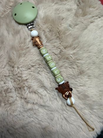 Attache tétine roi lion 