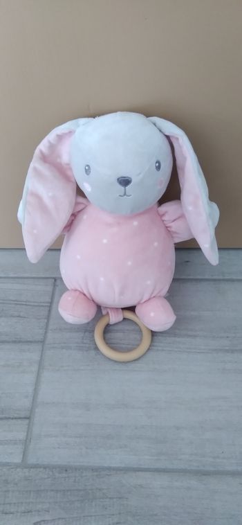 Lapin musical rose kiabi 