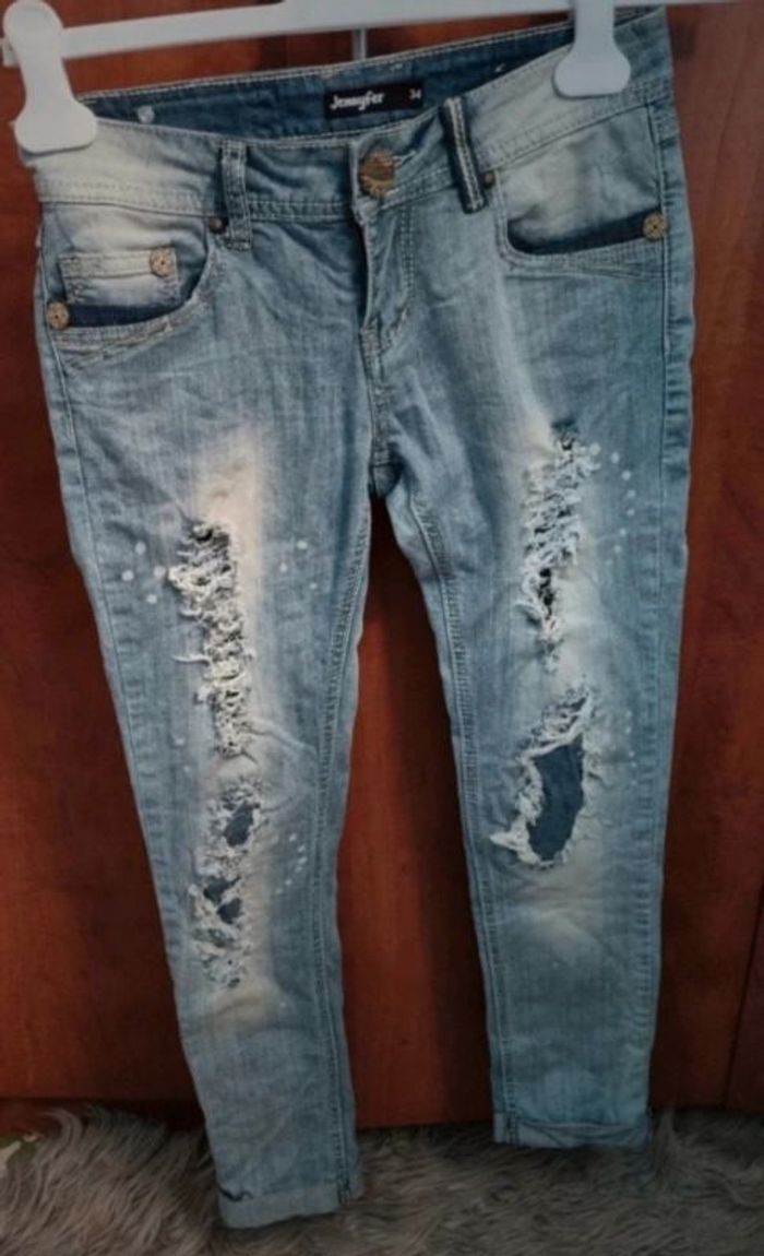 Jeans effet délavé avec troués taille 34 - photo numéro 1