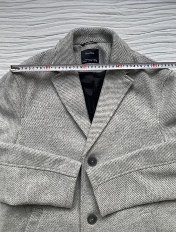 Manteau homme et chapeau gavroche