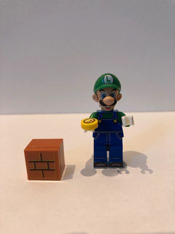 Figurine type lego Luigi. Super Mario