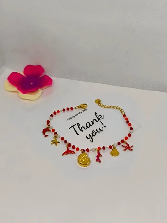 Bracelet doré et rouge avec perles de cristal et breloques de la mer - photo numéro 7