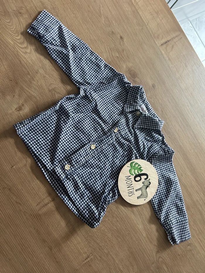 Chemise à carreaux blanche et bleu