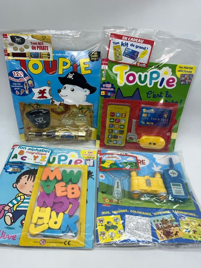 Lot de 4 magazines livres d'activités Toupie avec leurs jouets - photo numéro 1