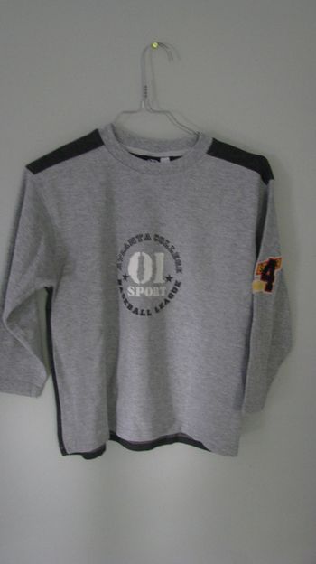 pull gris 134/140