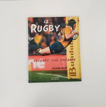 Livre Le Rugby raconté aux enfants de Richard Escot Édition La Martinière Jeunesse Très bon état.