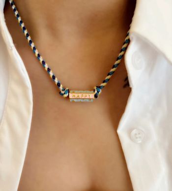 Collier ajustable coloré avec pendentif “Happy”