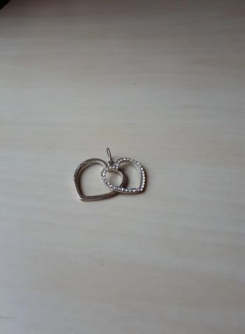 Pendentif argenté forme coeur