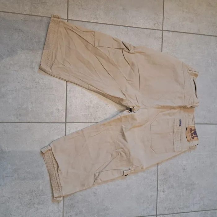 Short jeans qui arrive aux genoux