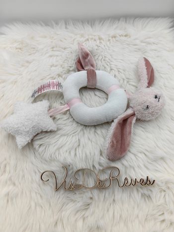 Hochet doudou d'activités Primark blanc et rose lapin étoile