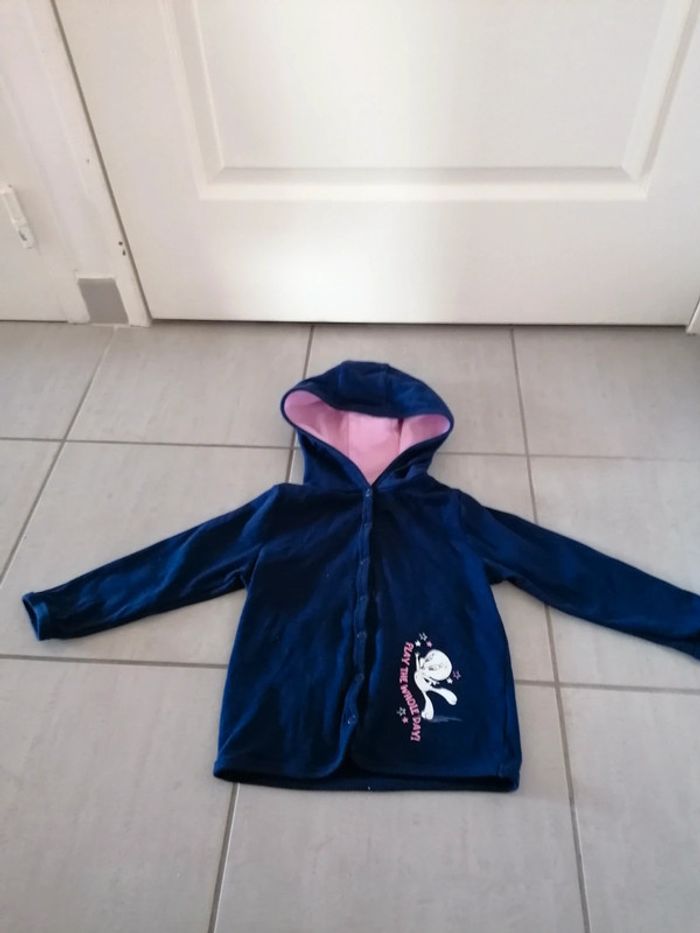 Sweat avec pressions titi très peu porté en excellent état