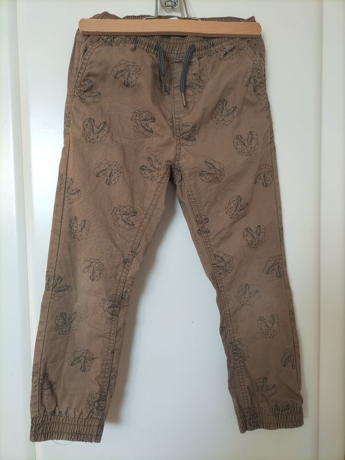 Pantalon marron dinosaure