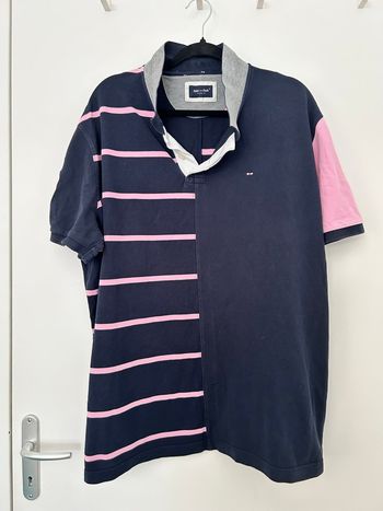 Polo manches courtes bleu marine et rose moitié uni motié rayé