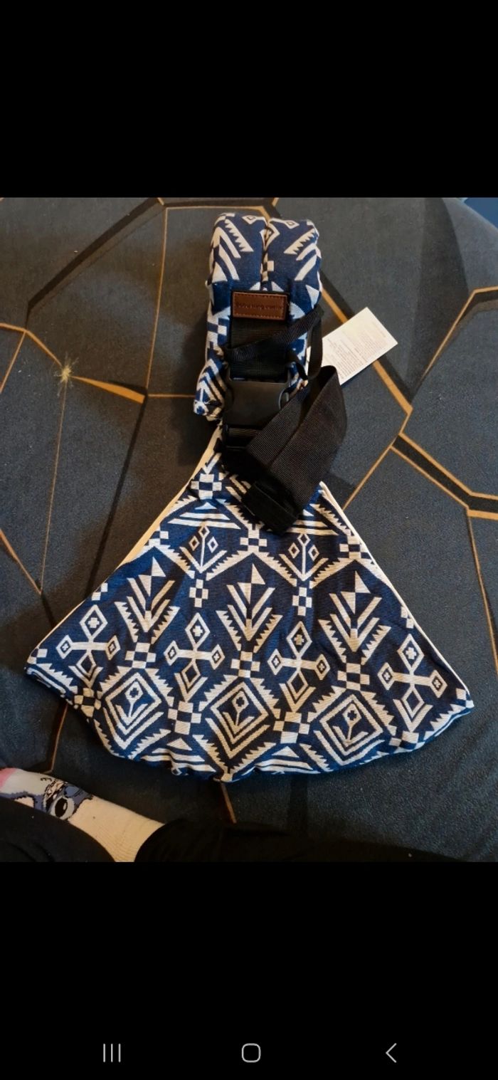 Porte bebe hanche