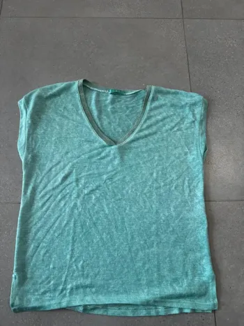 Haut turquoise taille XL made in italy, très bon état