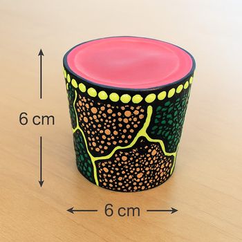 Mini corne de brume (Mini woowoozela) avec motifs aborigènes peints.