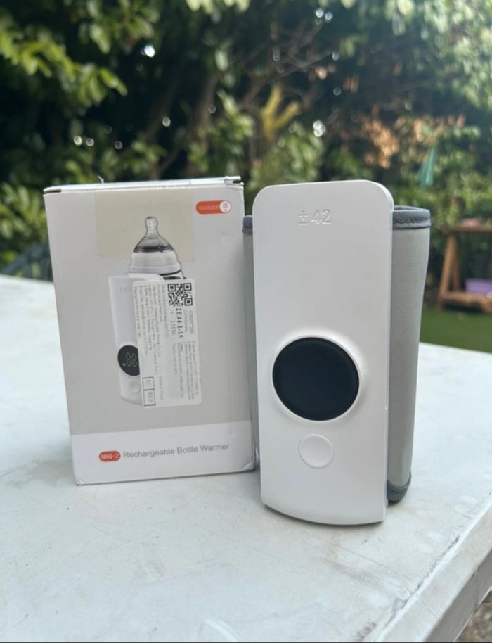 Chauffe biberon Neuf avec boite - chargeur - notice