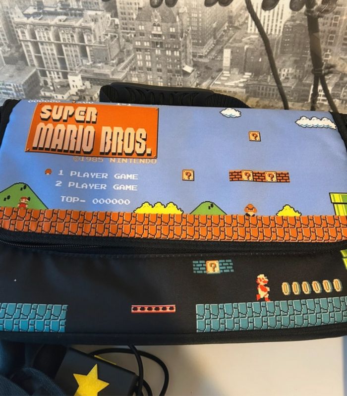 Nintendo Switch + accessoires - photo numéro 10