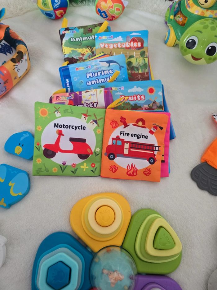 0_24 mois Lot  -60% 12 jouets eveil bébé peluches musicales livres et tortue pousse pousse - photo numéro 7