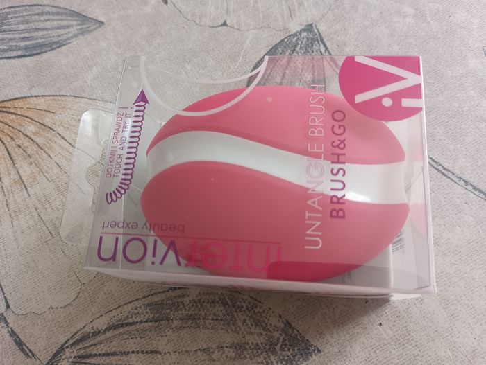 Brosse à cheveux format sac à main