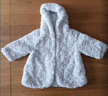 Manteau imitation fourrure