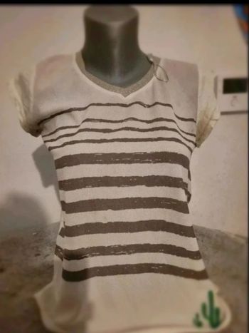 Haut avec col paillettes a motif en excellente état Taille S