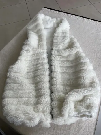 Veste sans manches 4/6 ans neuve