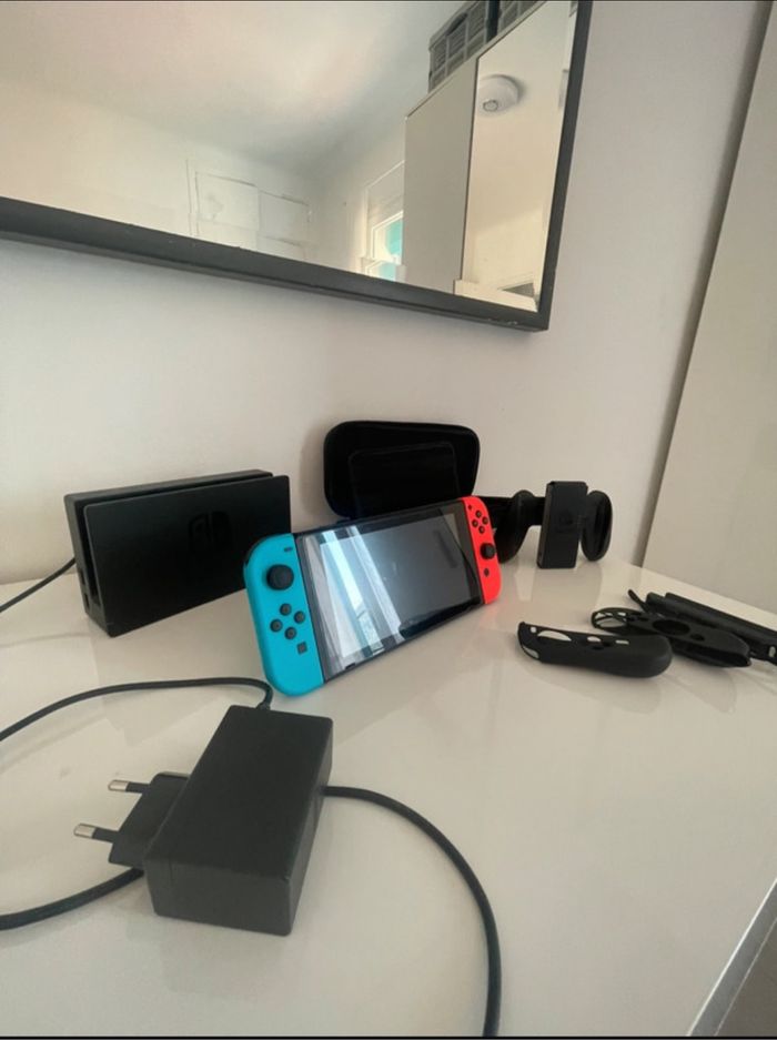 Nintendo switch + 2 jeux de vidéos de switch