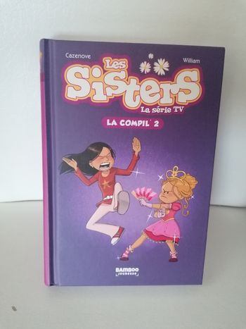 Livre les Sisters la compil n2 