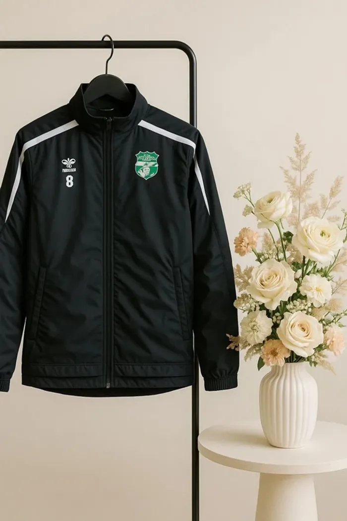 Doudoune noire foot taille S erima
