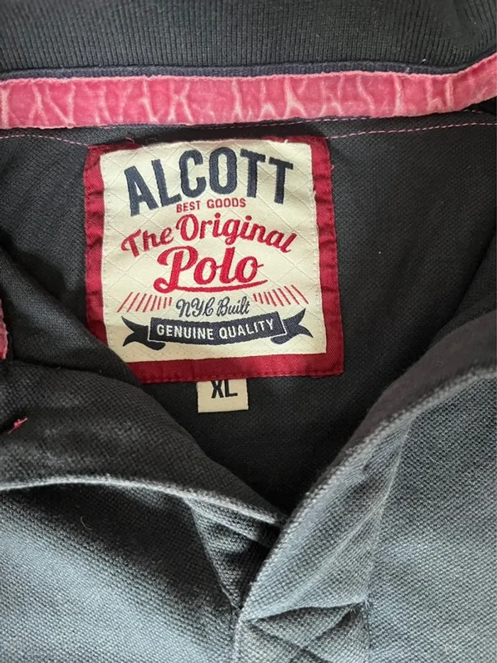 Polo bleu marine avec détails rose - photo numéro 3