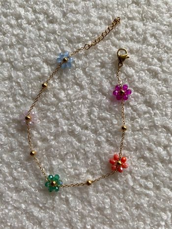 Bracelet marguerite perles doré