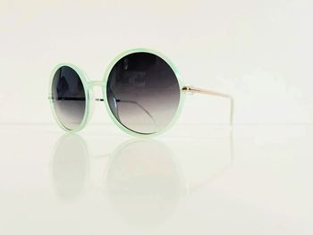 Lunette de soleil femme ronde verte menthe et dorée verres dégradés UV protection catégorie 3