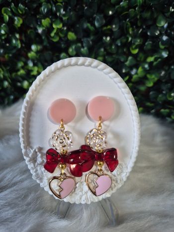 Boucles d’oreilles cœur et nœud