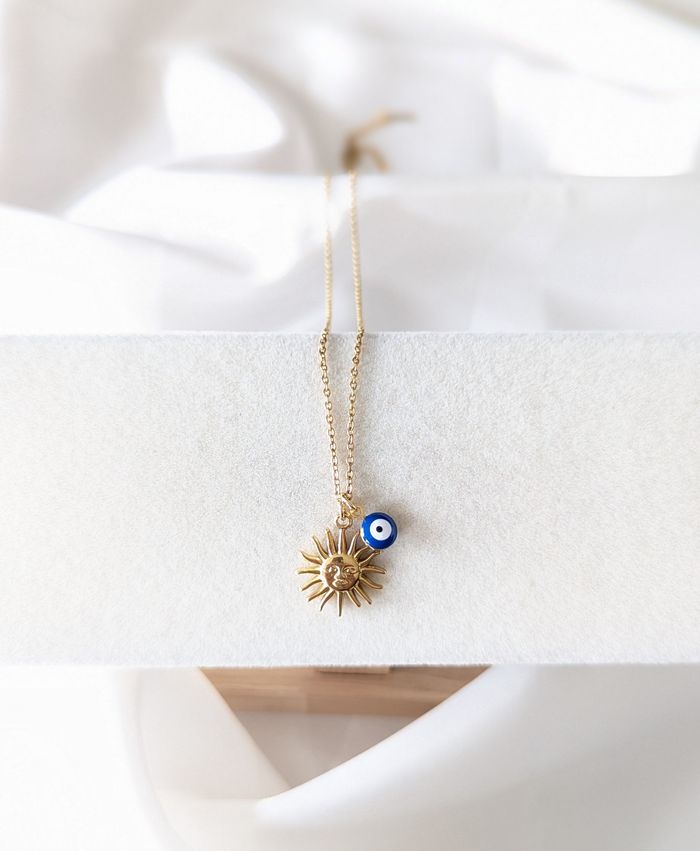 Collier soleil œil grec
