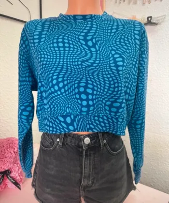 Sweat bleu court à motifs taille S