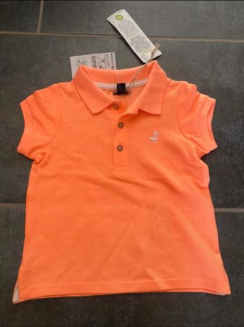 Polo orange fluo Kiabi Taille 18 M