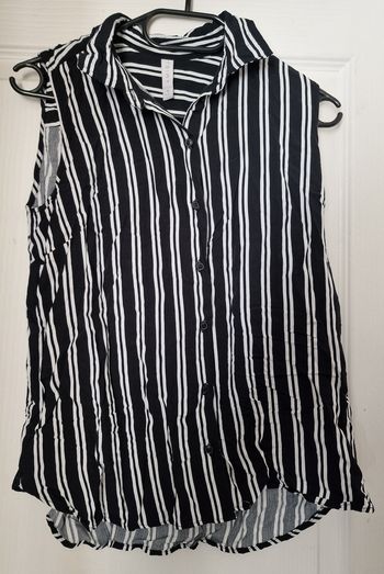 Chemise sans manches neuve 38