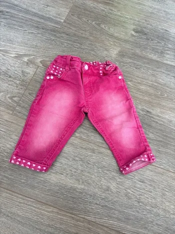 Jean rose avec détails cœurs en 6 mois