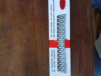 Fixation pour canevas neuf