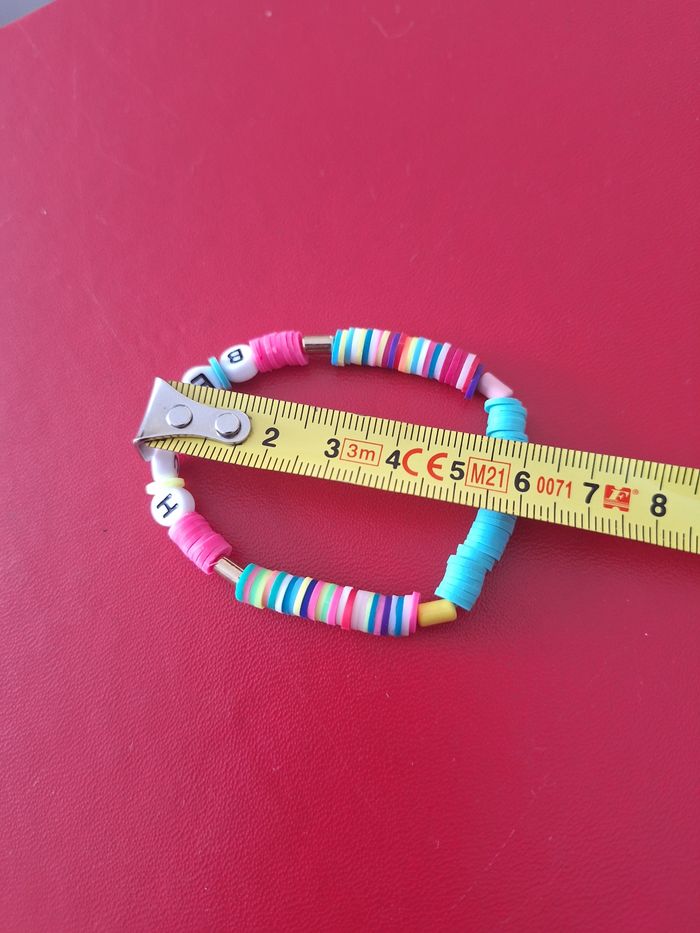 Neuf Bracelet fille à perles plates et marqués BEACH - photo numéro 3