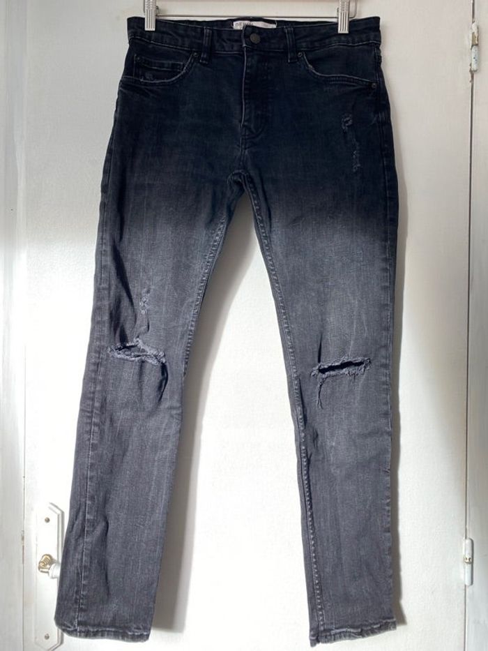 Jean slim troué