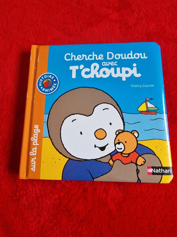 Livre cherche doudou avec t'choupi sur la plage