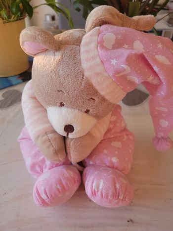 Doudou  ours rose boîte à musique