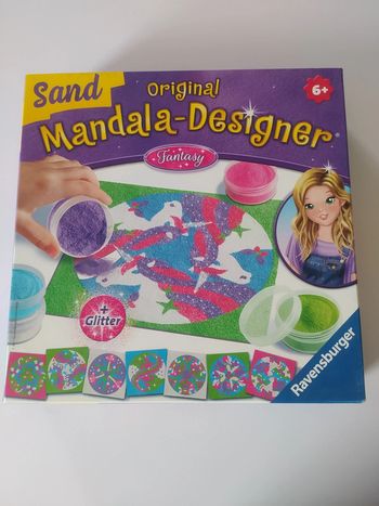 Mandala designer avec sable