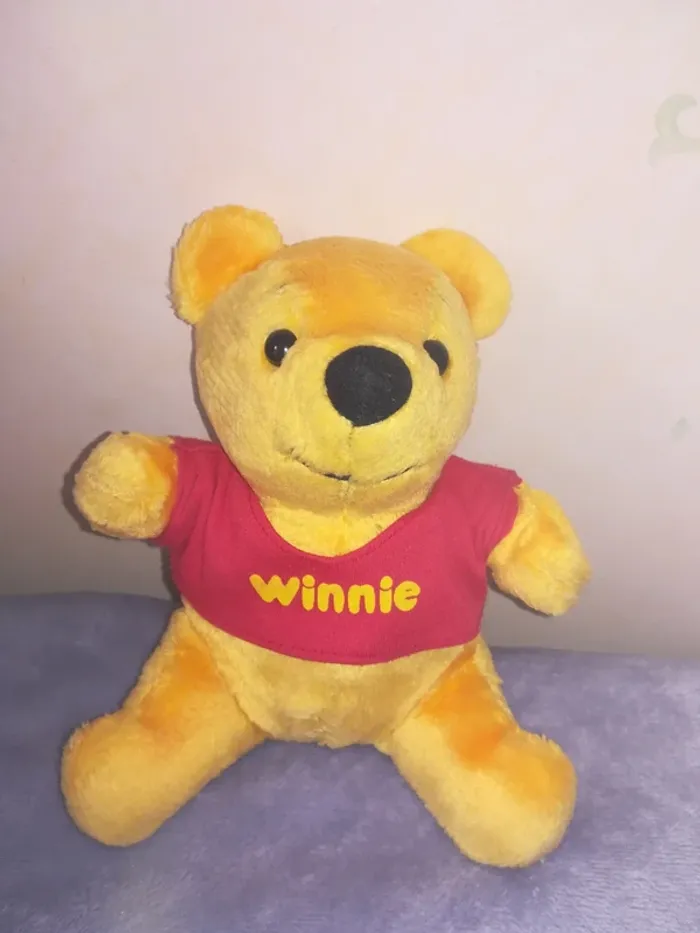 Petit doudou Winnie l'ourson
