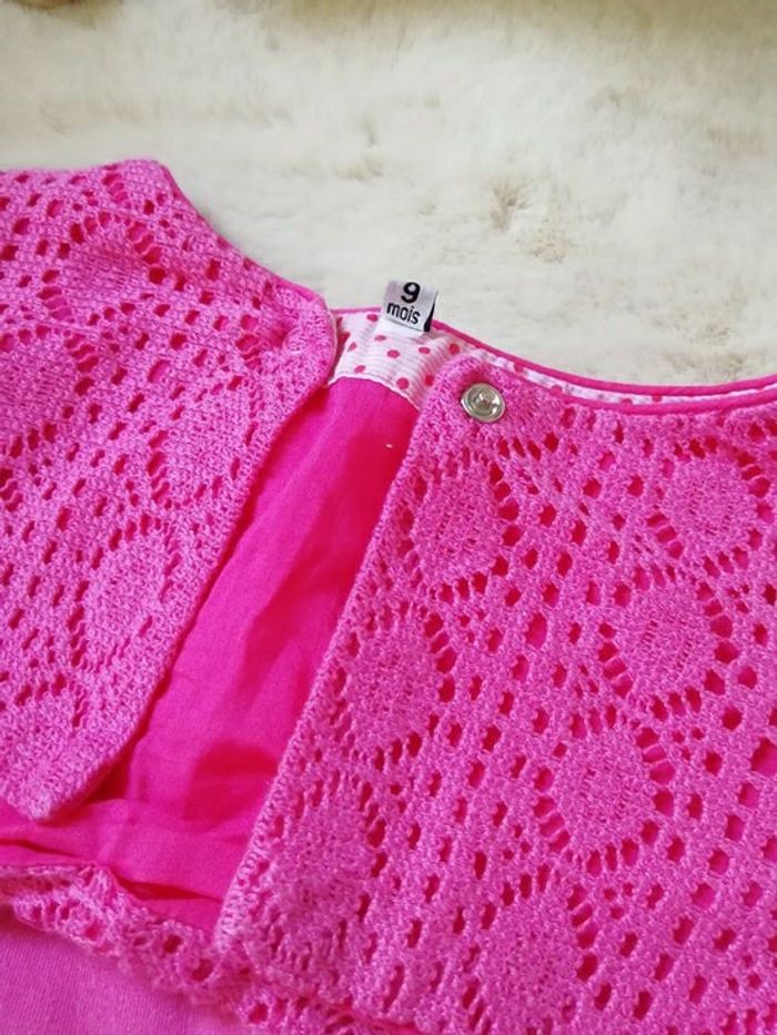Boléro fuschsia effet crochet 9 mois